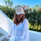 Wiild Swimwear Mahua Cap in beige color viewed from the front on model